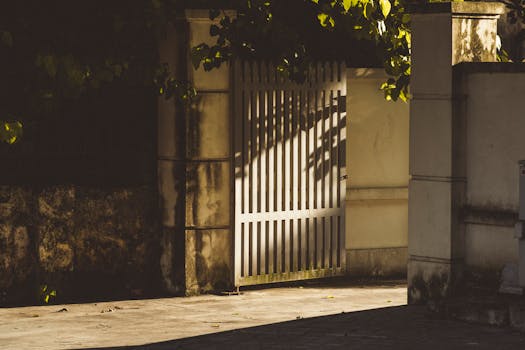 Garage door repair technician fixing a residential garage door in Central Texas